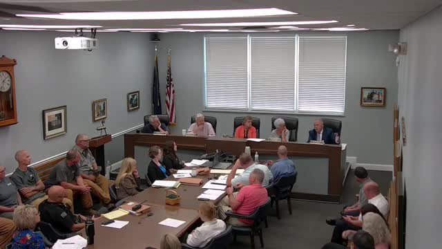 Budget Debate Sparks Controversy Over Employee Pay Raises