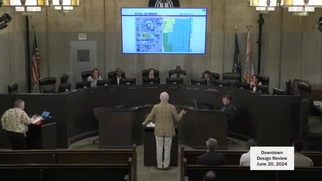 Neighborhood group demands delay on controversial parking lot plan