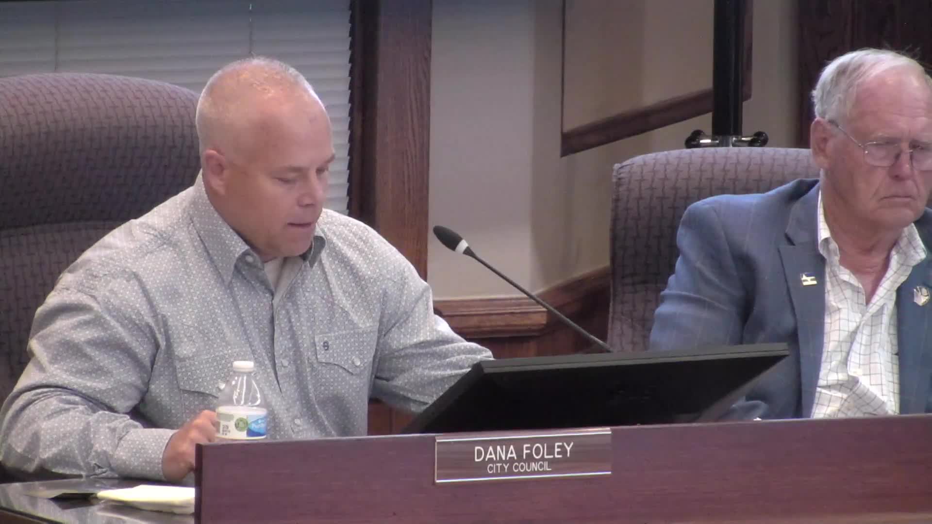 Council debates funding cuts amid rising community concerns