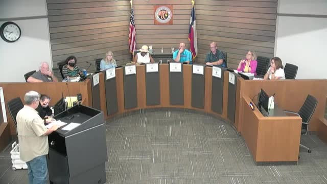 Residents rally against controversial housing development plan