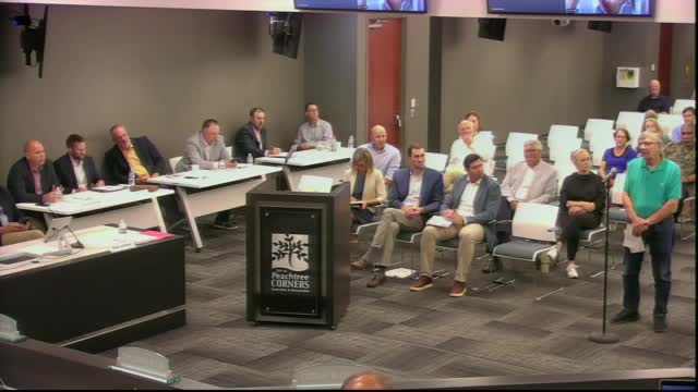 Residents clash over controversial mixed-use development proposal