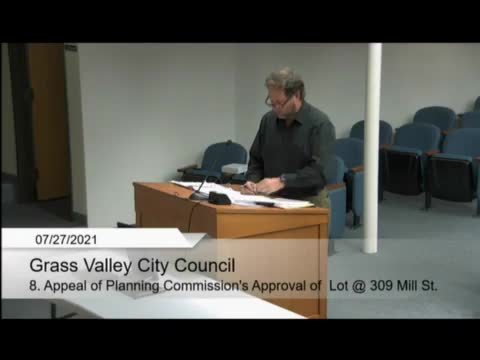 City parking lot proposal sparks heated community debate