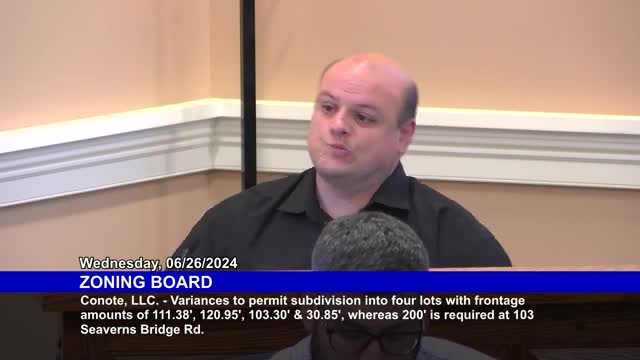 Zoning board approves controversial garage variance request