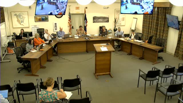 Town and county clash over budget and revenue strategies