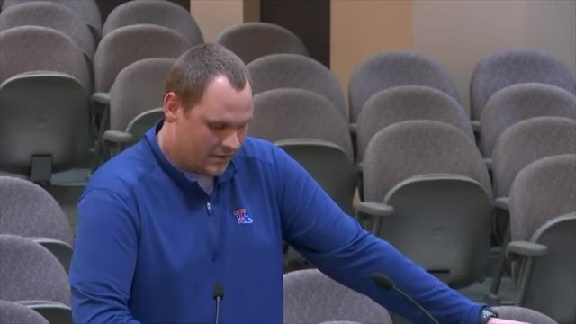 Board member defends crucial agreement in heated debate