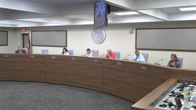 Board approves controversial tax increase and membership dues