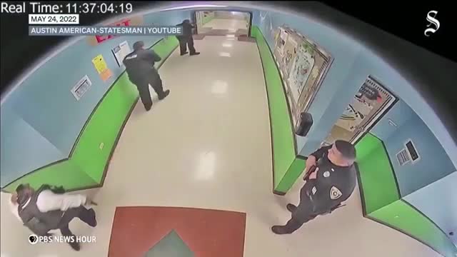Security footage reveals officers retreating during school shooting