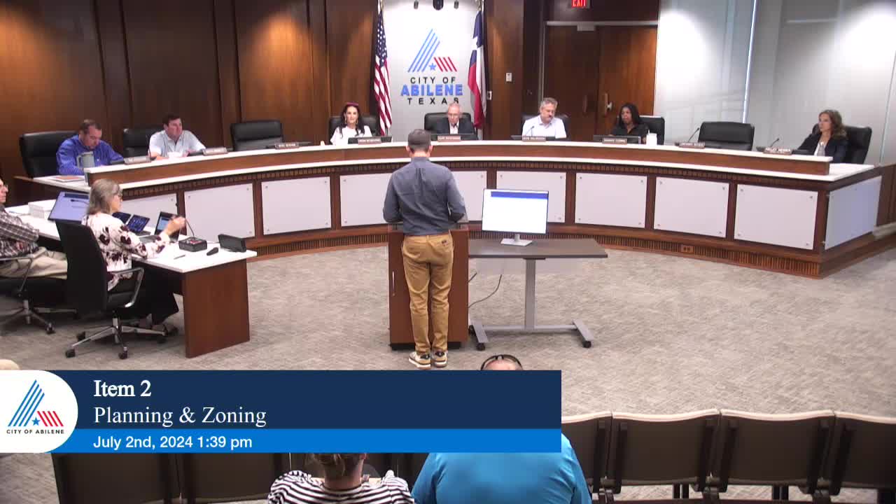 Neighbors rally against proposed multifamily housing development