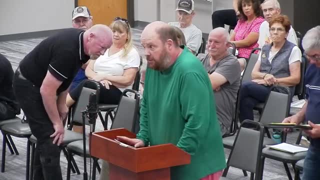 Residents rally against proposed road threatening Ammon Park