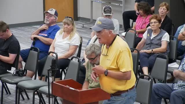 Residents rally against proposed massive apartment development