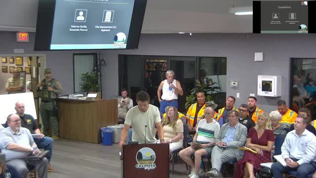 Residents rally against controversial commercial development plan