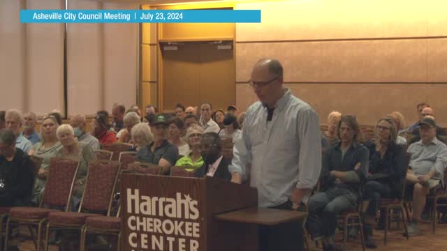 Residents rally against controversial townhome development plan