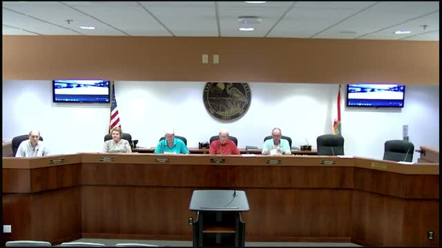 Property owners clash over flooding and parking lot crisis