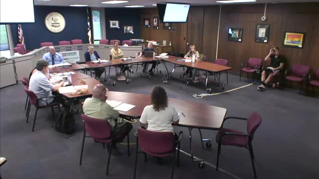 Board debates controversial partnership for school improvement
