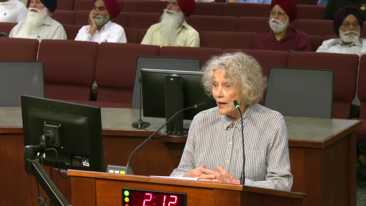 Residents rally against controversial housing project relocation