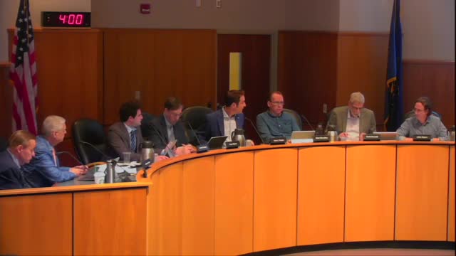 Council debates controversial parking garage plan amid community concerns