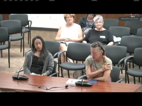 Community leaders demand halt to controversial housing development