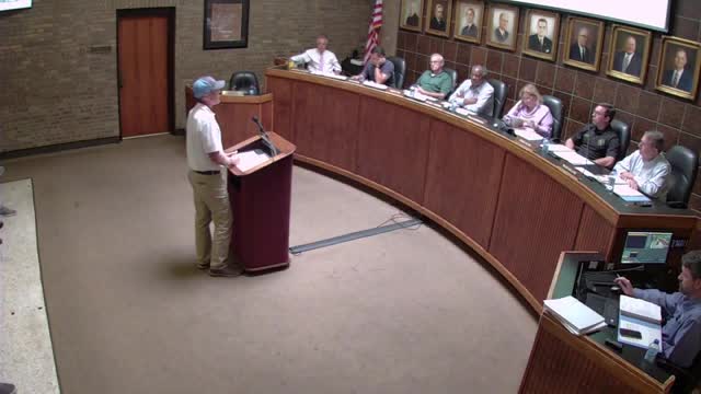 Residents challenge new apartment development amid community concerns