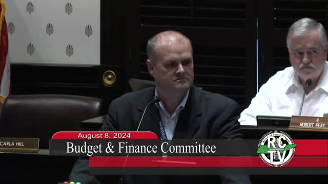 Commissioners debate crucial tax increase for school funding