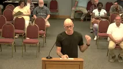 Residents rally against proposed zoning change for duplexes