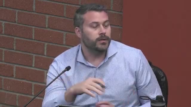 City debates parking regulations amid housing cost crisis