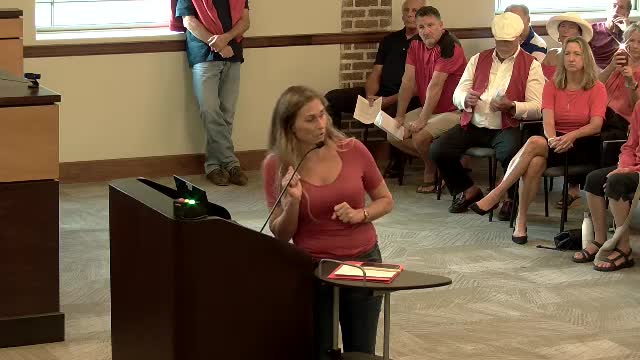 Residents rally against controversial parking garage proposal