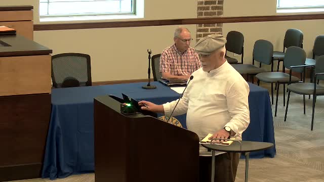 City officials urged to reject controversial development plans