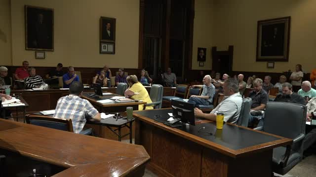 Chairman faces backlash over controversial budget decisions