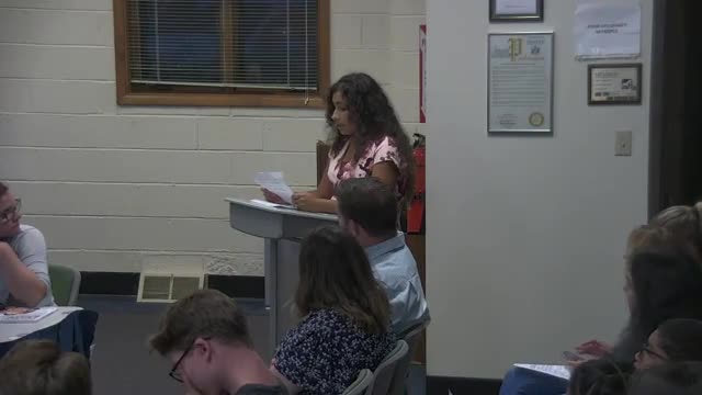 Teacher fights termination while eight months pregnant