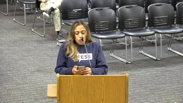 Activist demands justice for Gaza victims at board meeting
