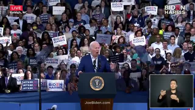 Biden vows to defend democracy against Trump threat