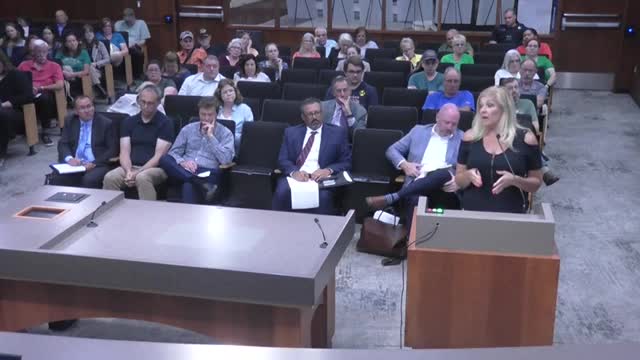 Residents rally against controversial apartment complex proposal