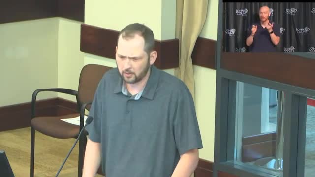 Budget Cuts and Salaries Spark Heated Debate in Johnson County