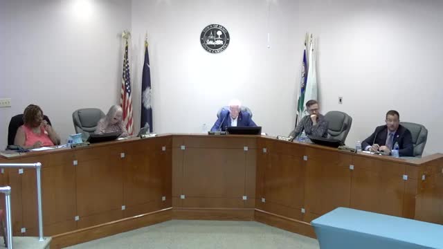 Town council faces heated debate over water walk project