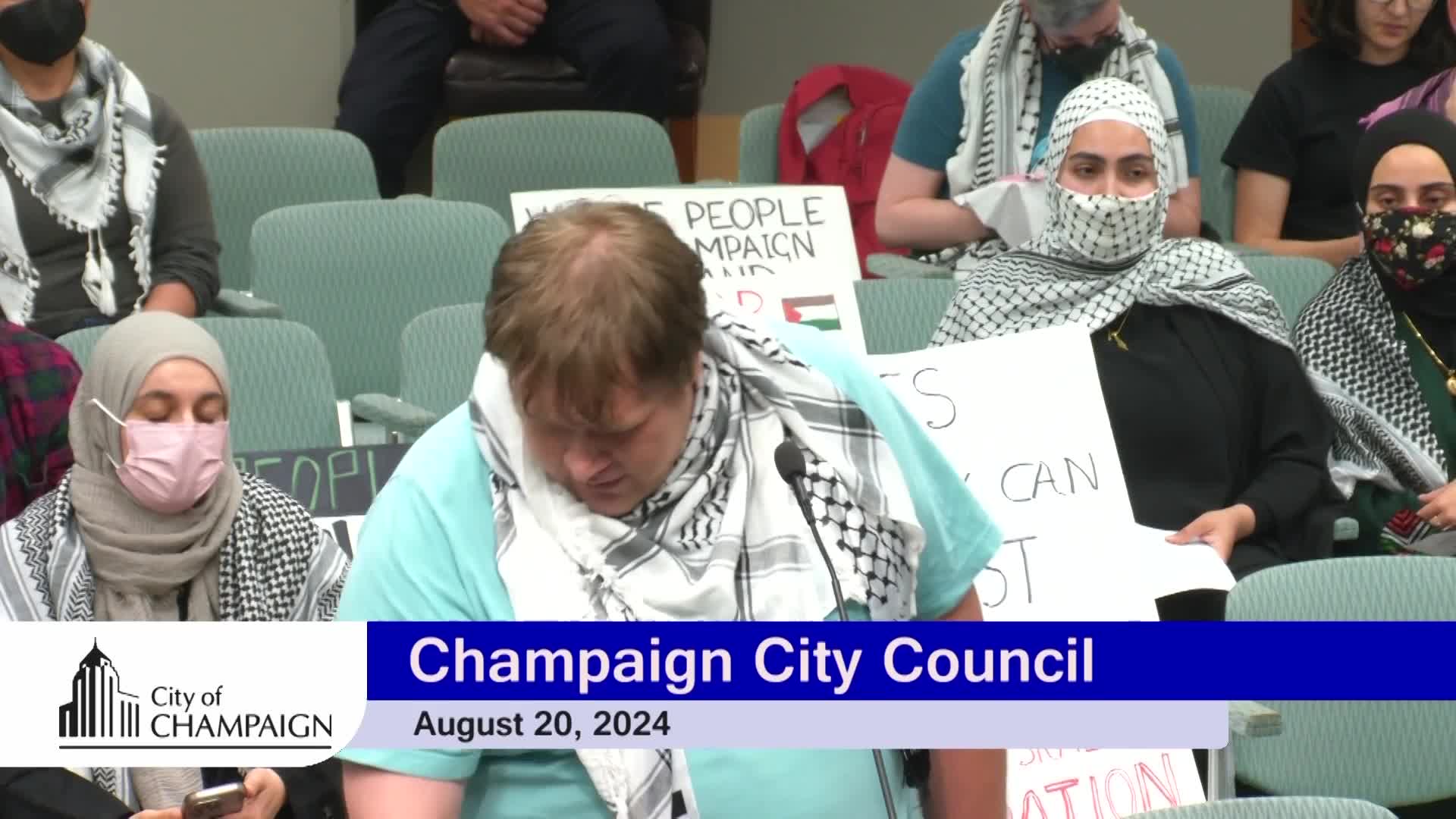 Activists demand action against war profiteering in Champaign