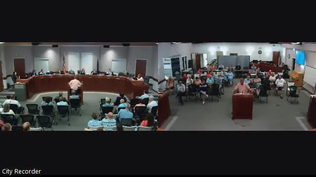 Council debates controversial tree removal and voucher program