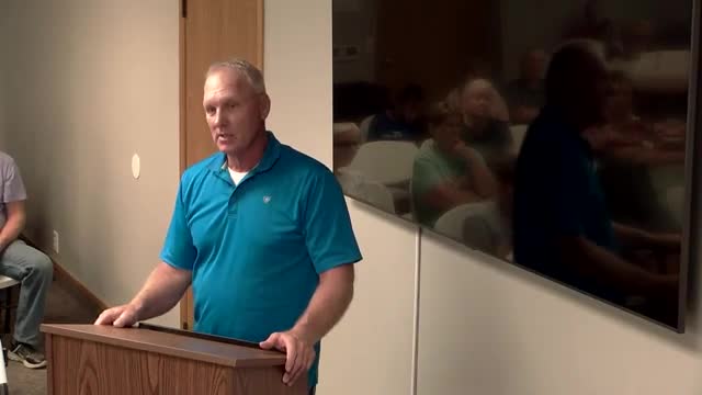 Community debates solar farm regulations amid environmental concerns