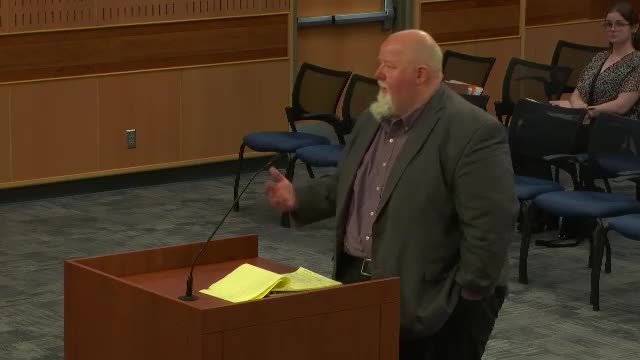 Neighbors Rally Against Controversial Seven Story Development