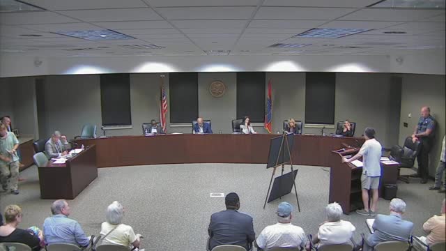 Residents rally against proposed development threatening community safety