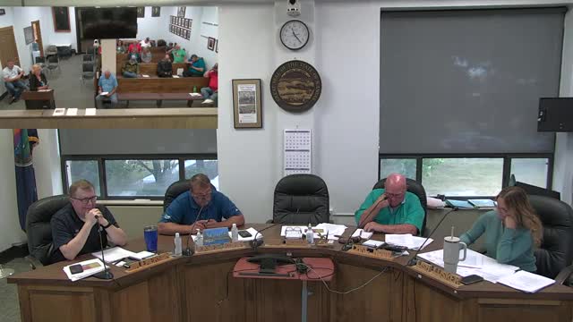 Community debates green energy benefits amid tax concerns