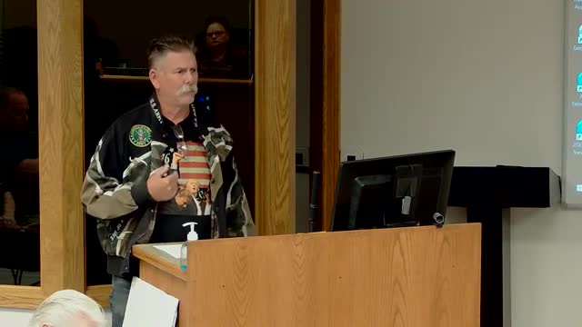 City official threatens lawsuit amid budget hearing tensions