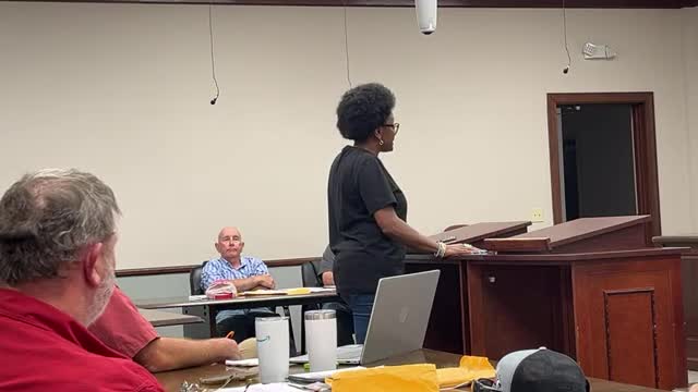Commissioners clash over school board tie decision