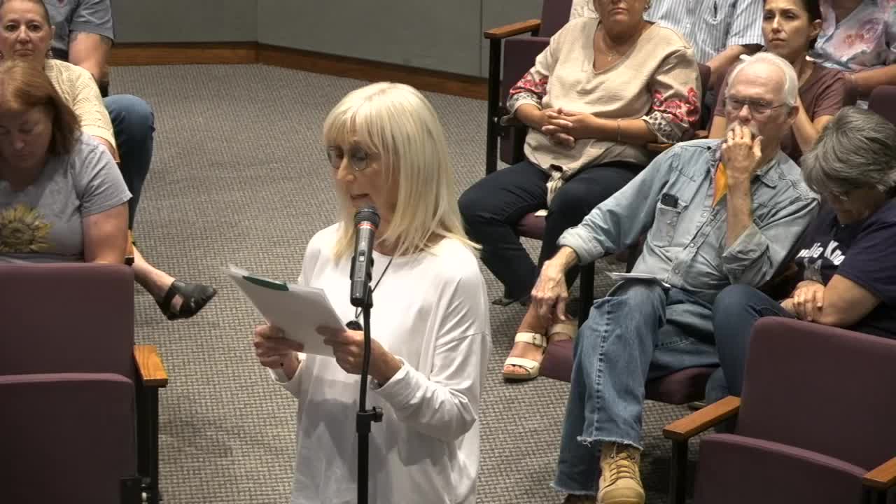 Residents rally against proposed development threatening community's future