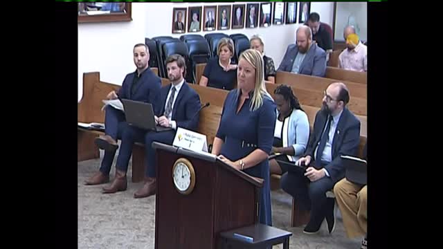 City planners clash over controversial apartment development proposal