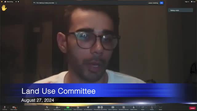 Residents clash over garage conversion amid privacy concerns