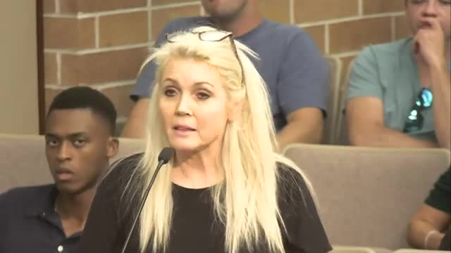 Residents rally against controversial housing development plans
