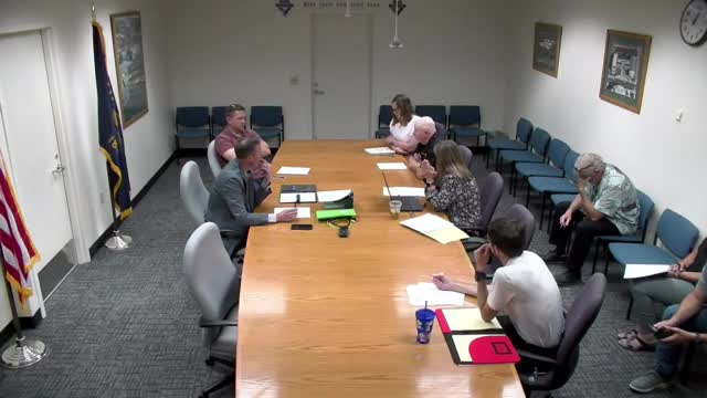 County Officials Debate Medical Director Salary Amid Rising Workload