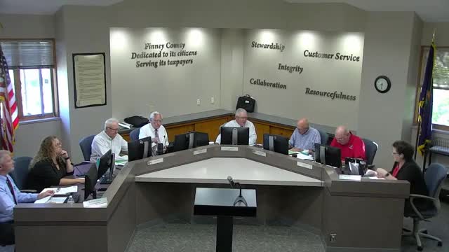 County officials debate budget cuts amid rising property taxes