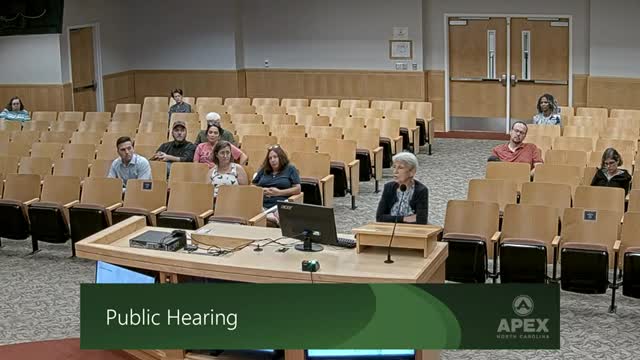 Residents rally against controversial townhome development plans