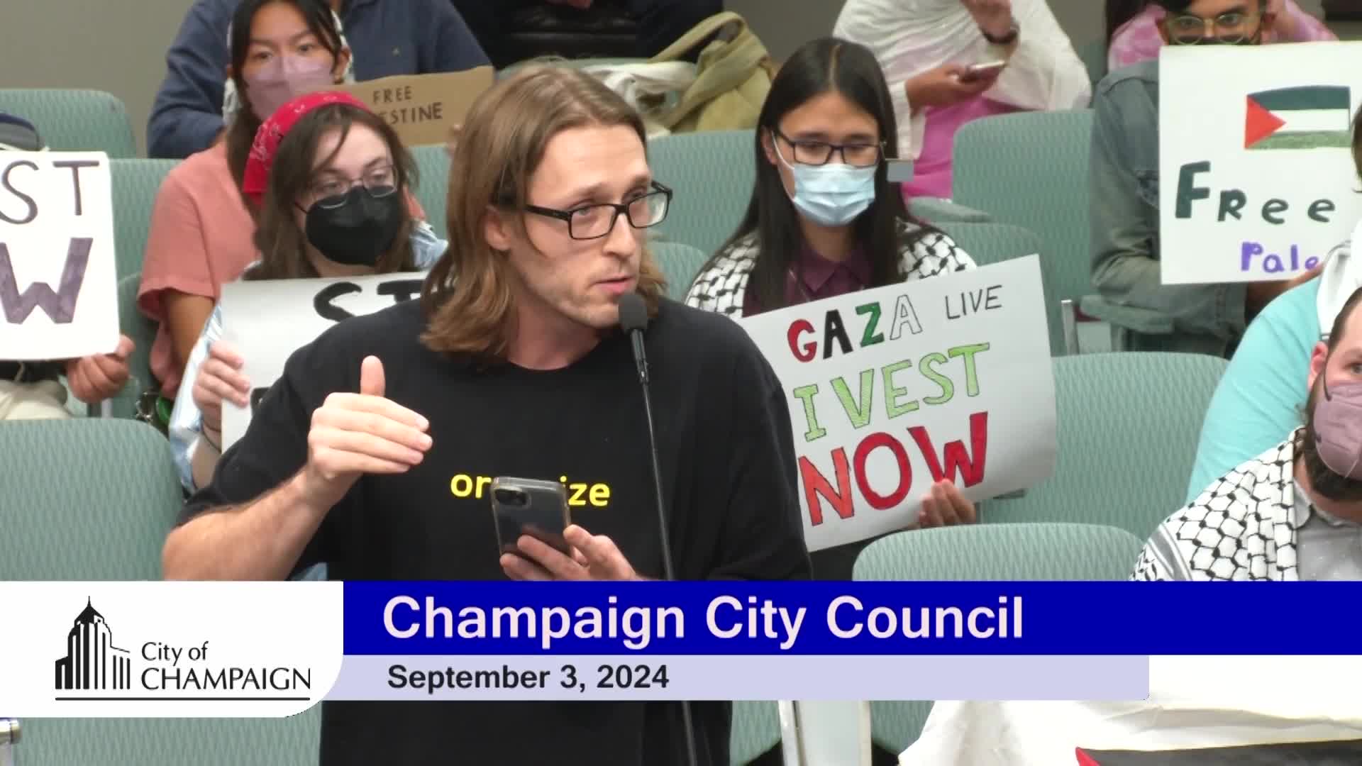 Activists demand divestment from genocide at city council meeting